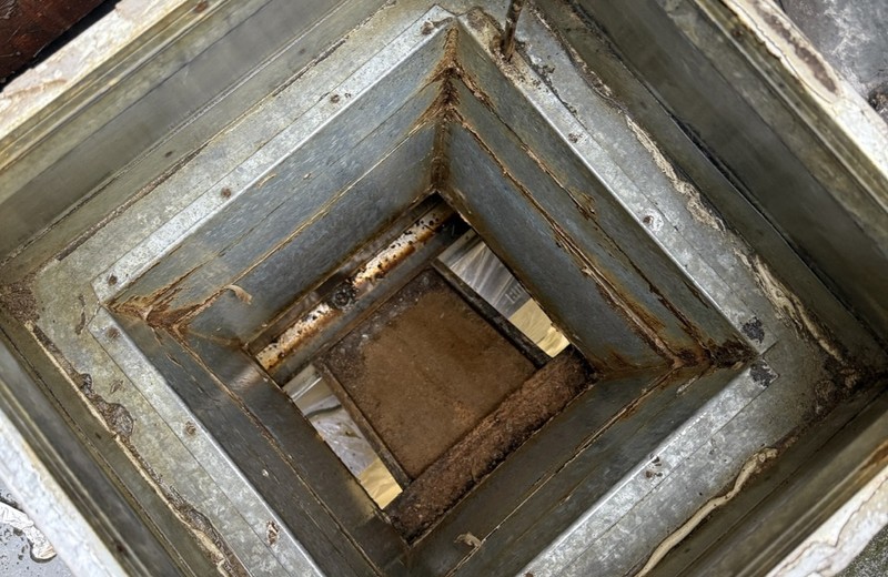 Rooftop kitchen extract fan and ductwork in Aberdare