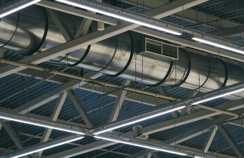 Rooftop kitchen extract fan and ductwork in Ashford