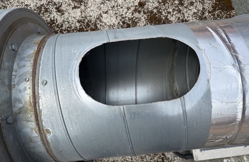 Rooftop kitchen extract fan and ductwork in Harlow