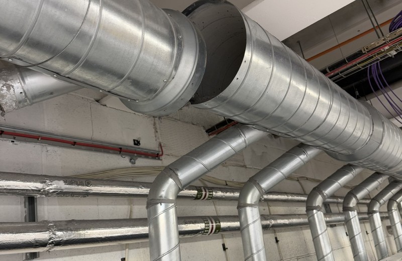 Rooftop kitchen extract fan and ductwork in Reigate