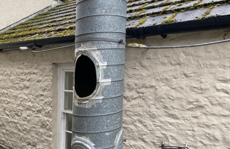 Rooftop kitchen extract fan and ductwork in Swansea