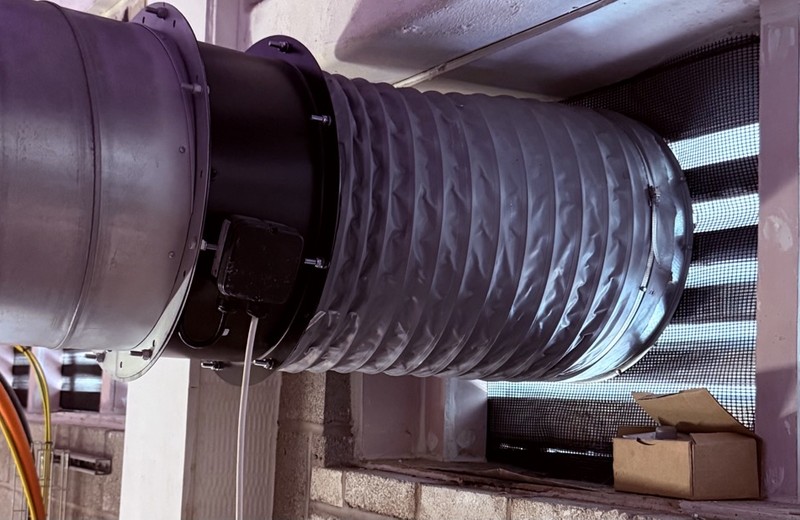 Rooftop kitchen extract fan and ductwork in Swindon
