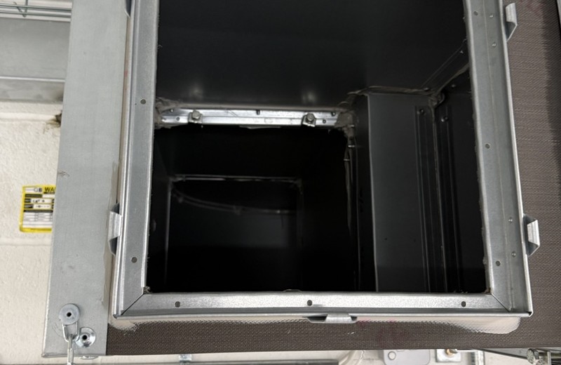 Rooftop kitchen extract fan and ductwork in Watford