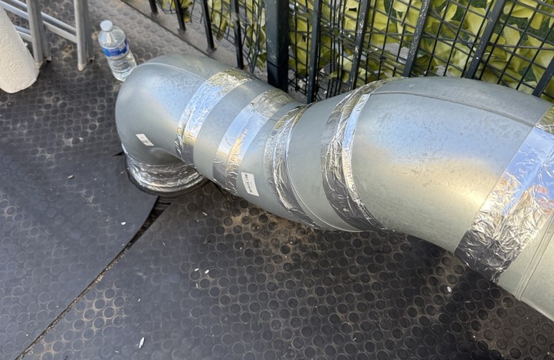 Rooftop kitchen extract fan and ductwork in Wigan